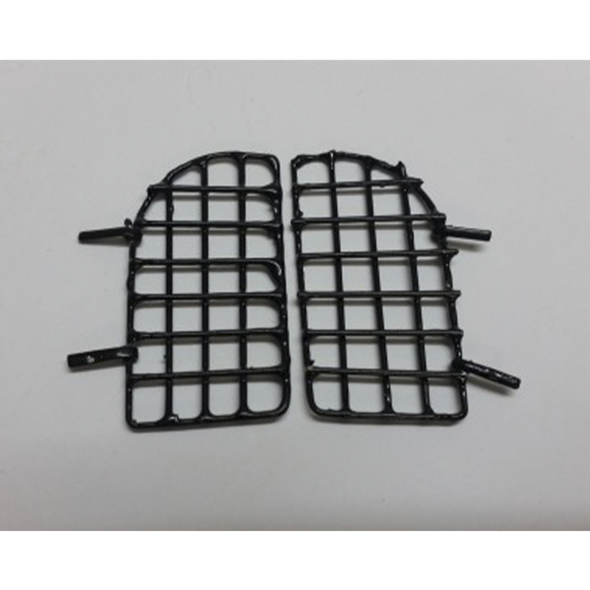 zweiteiliges, schwarz lackiertes Tor/Fenstergitter mit Rundbogen