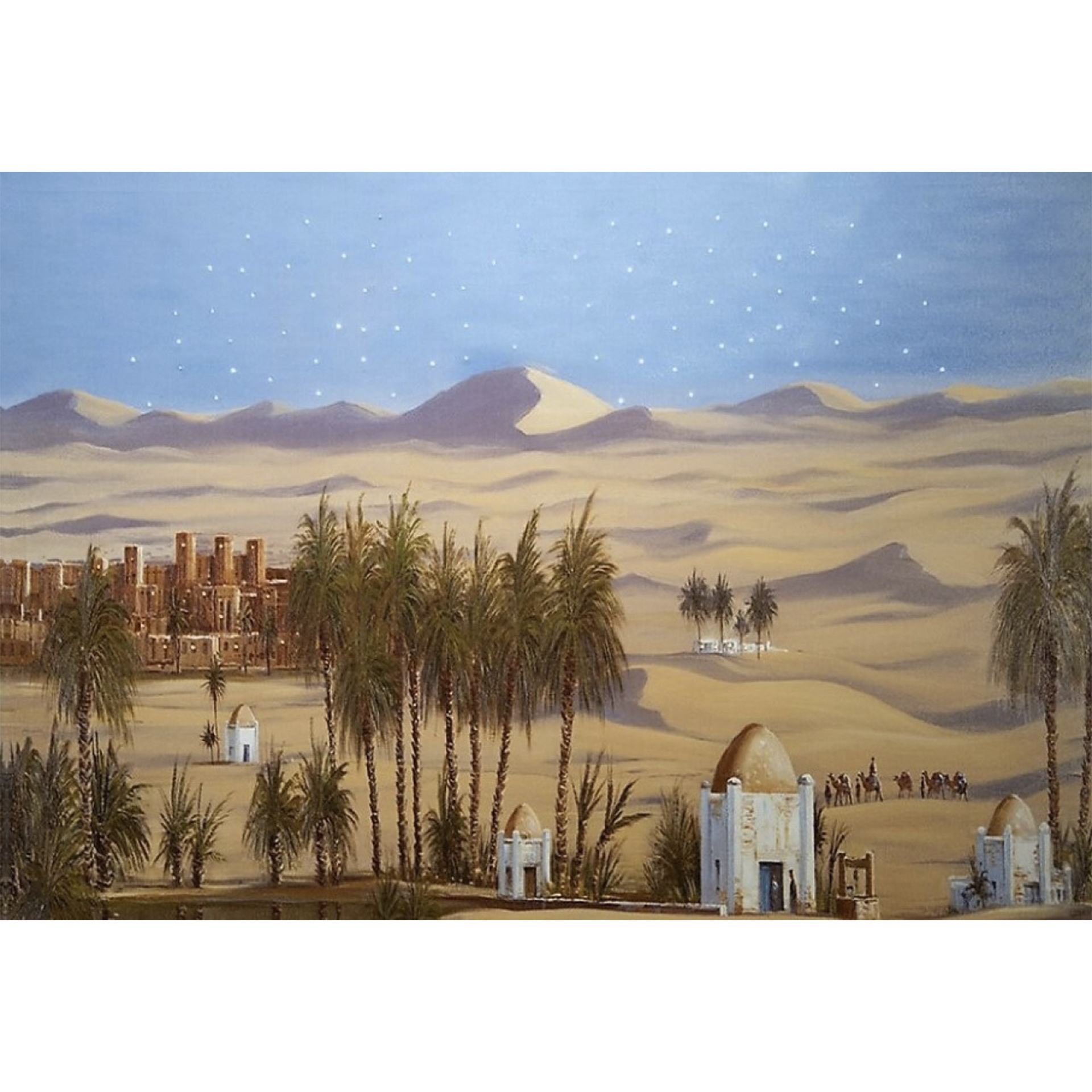 Gebäude und Palmen in Wüste mit blauem Himmel