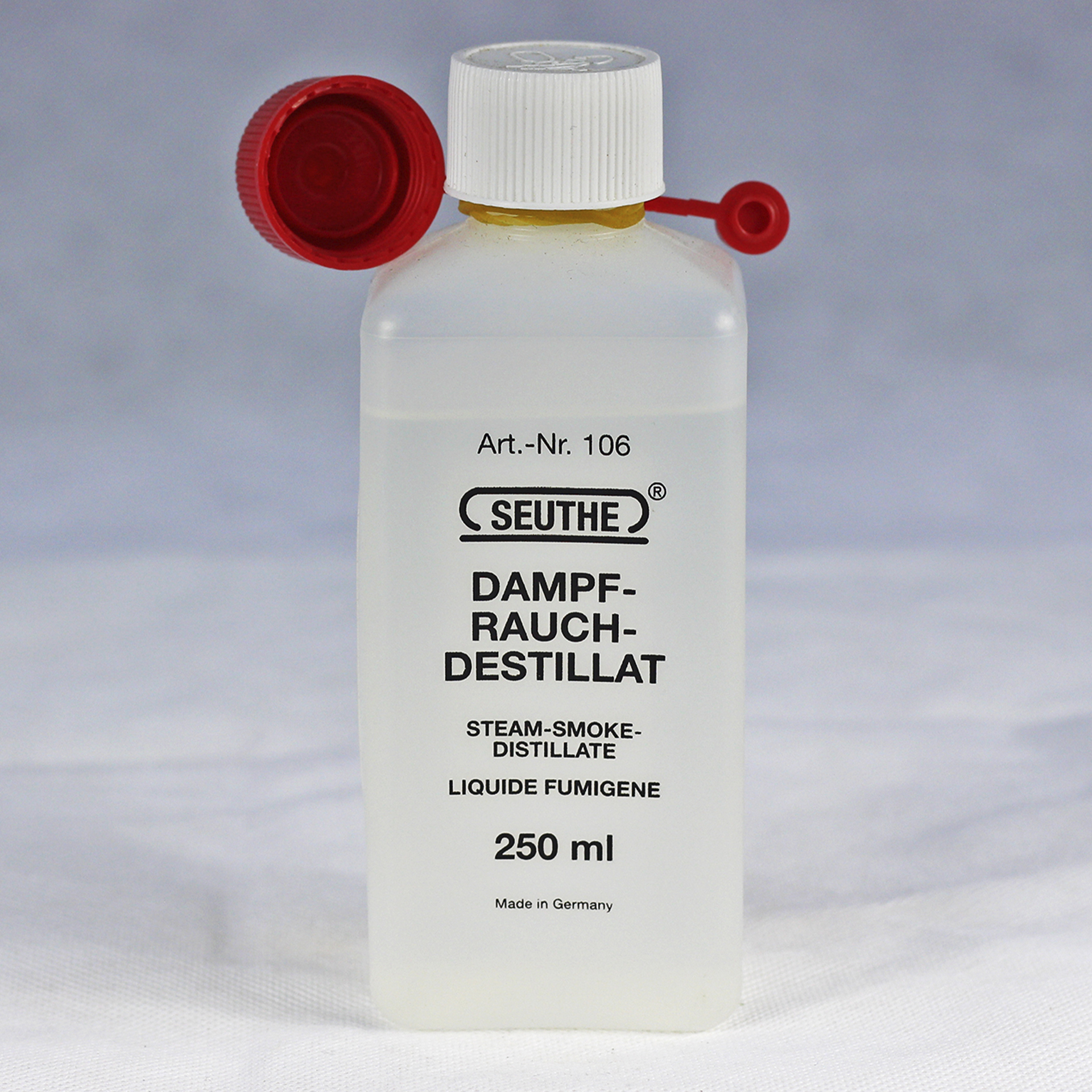 Flasche Destillat mit Spritzverschluss